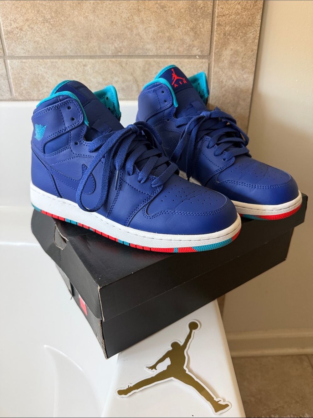 Jordan Mid Top Sneakers in Navy with Teal & Red Accents